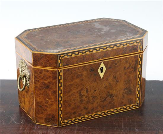 A Victorian birds eye yew elongated octagonal tea caddy, 8.5in.